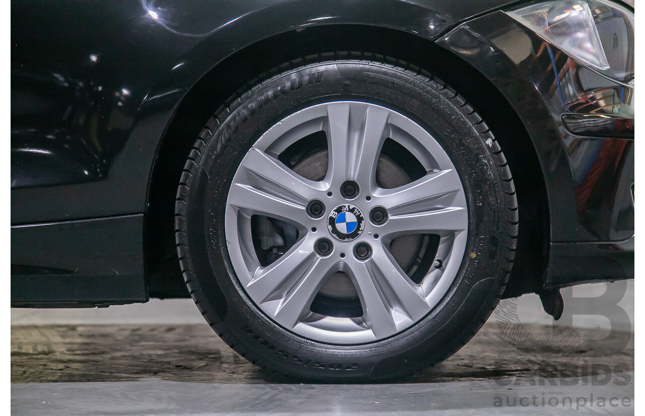 6/2010 BMW 118i E87 MY10 5d Hatchback Black 2.0L