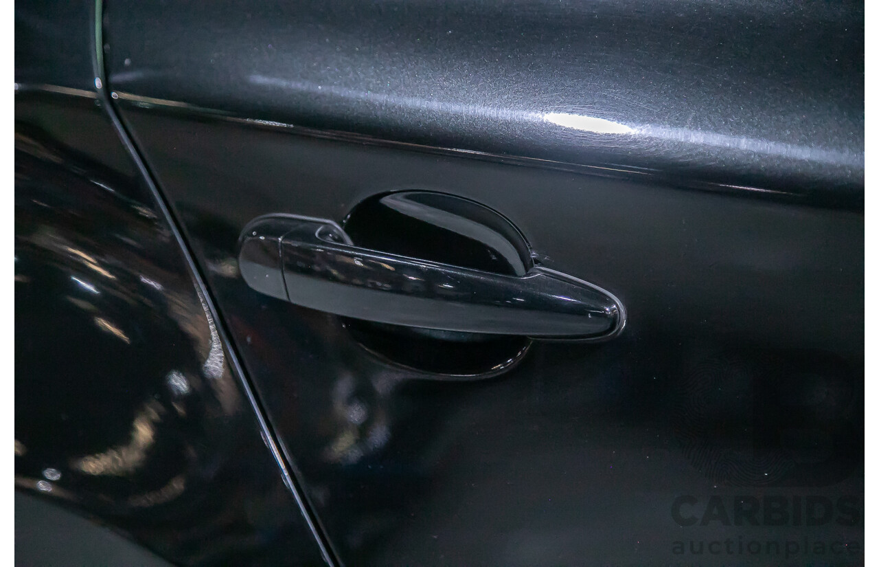 6/2010 BMW 118i E87 MY10 5d Hatchback Black 2.0L