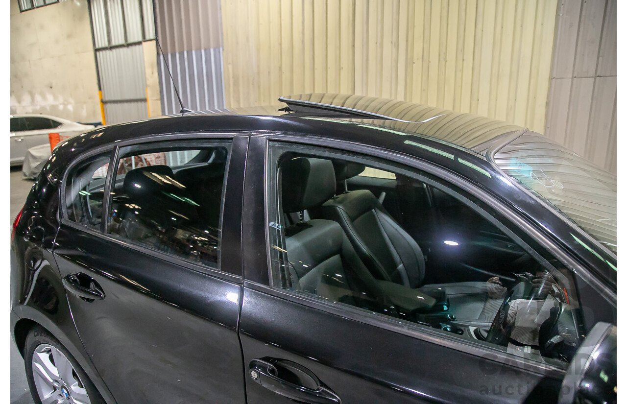6/2010 BMW 118i E87 MY10 5d Hatchback Black 2.0L