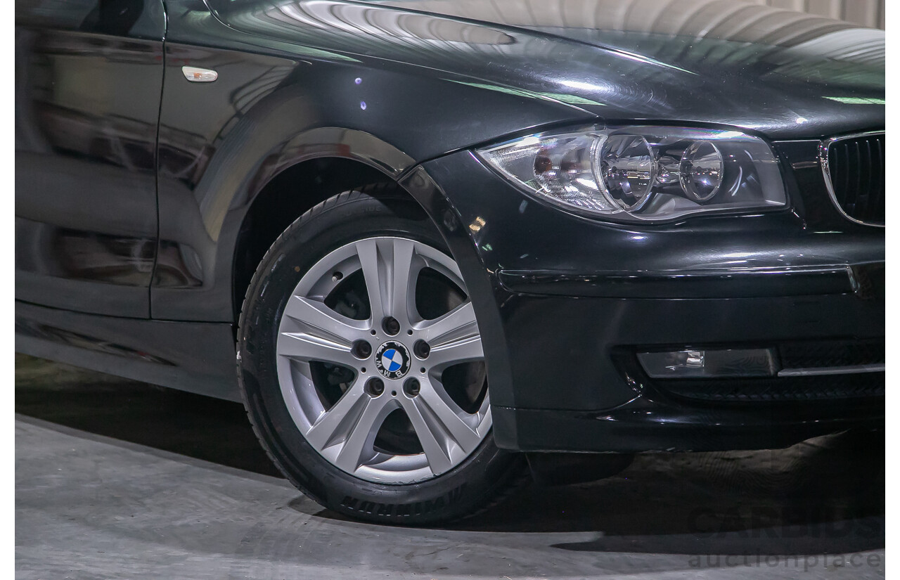 6/2010 BMW 118i E87 MY10 5d Hatchback Black 2.0L