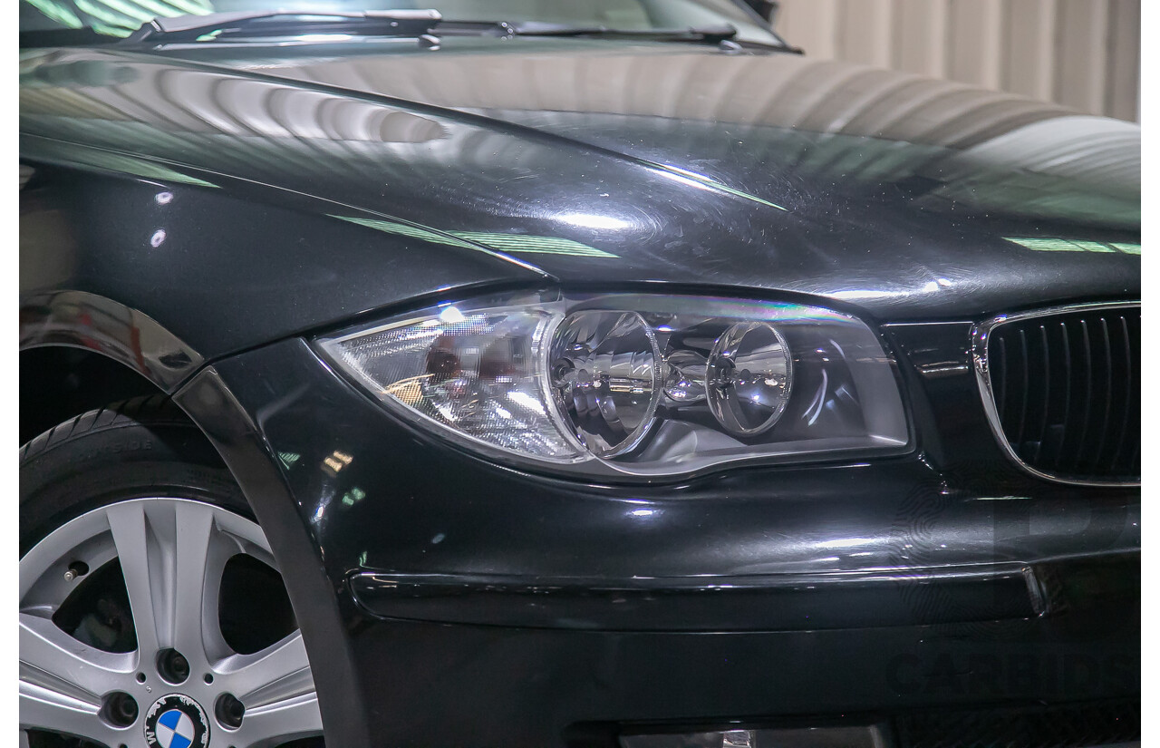 6/2010 BMW 118i E87 MY10 5d Hatchback Black 2.0L
