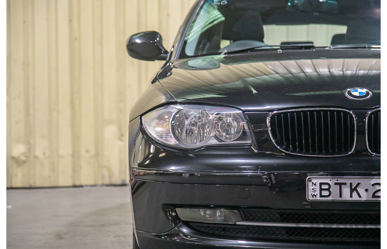 6/2010 BMW 118i E87 MY10 5d Hatchback Black 2.0L