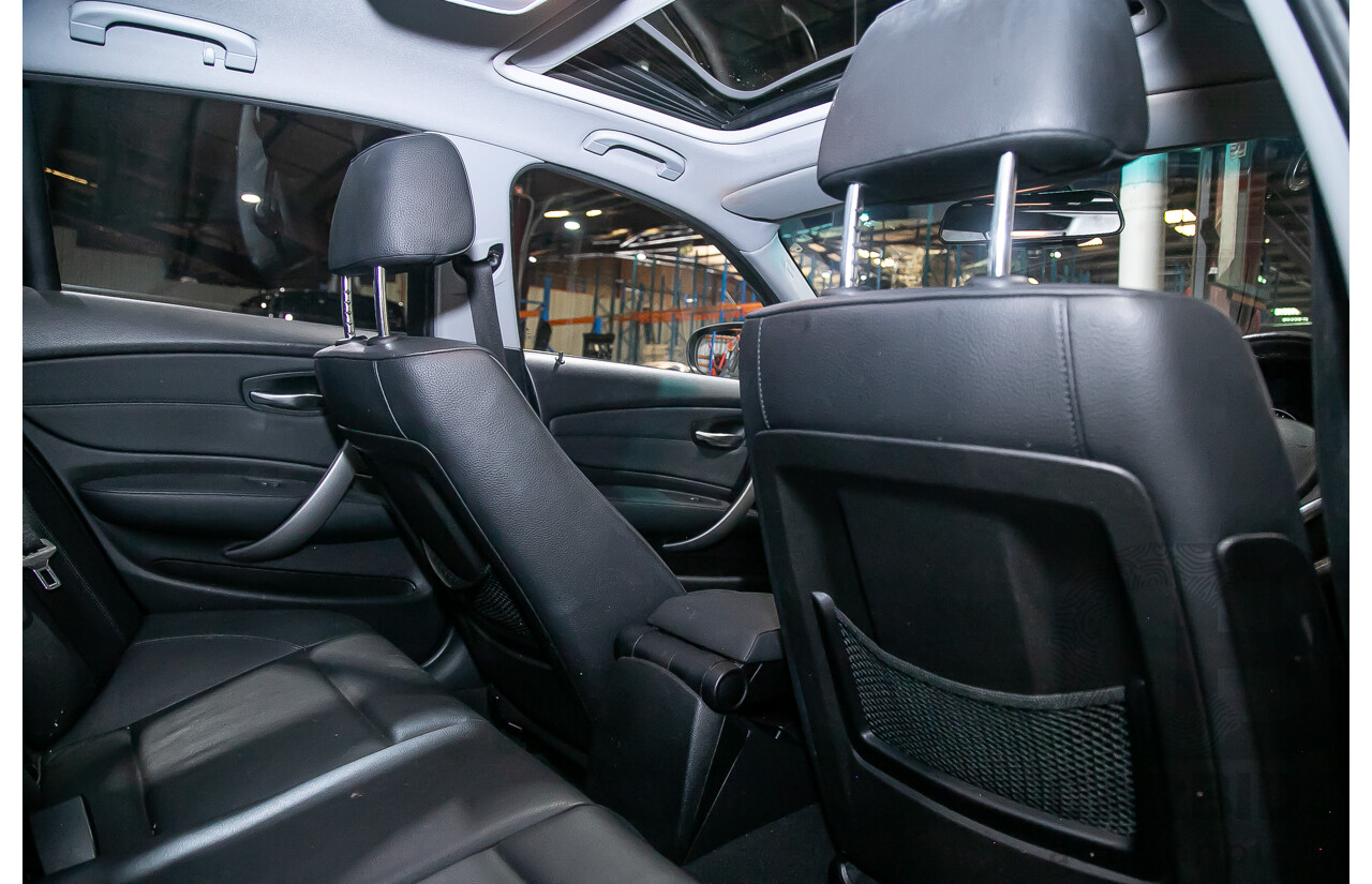 6/2010 BMW 118i E87 MY10 5d Hatchback Black 2.0L