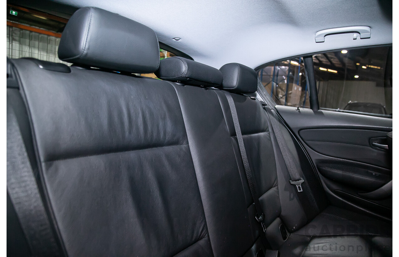 6/2010 BMW 118i E87 MY10 5d Hatchback Black 2.0L