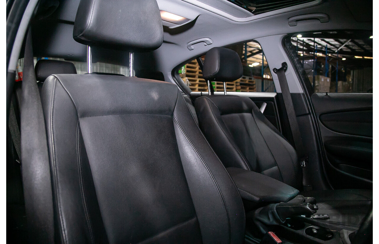 6/2010 BMW 118i E87 MY10 5d Hatchback Black 2.0L