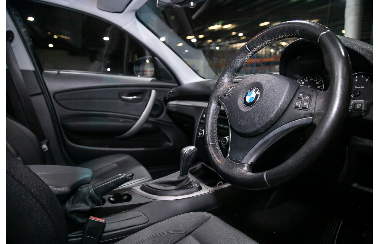 6/2010 BMW 118i E87 MY10 5d Hatchback Black 2.0L