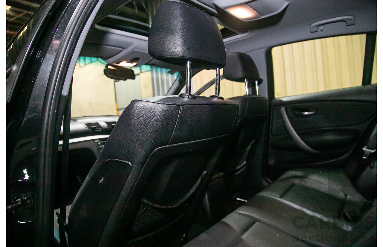 6/2010 BMW 118i E87 MY10 5d Hatchback Black 2.0L