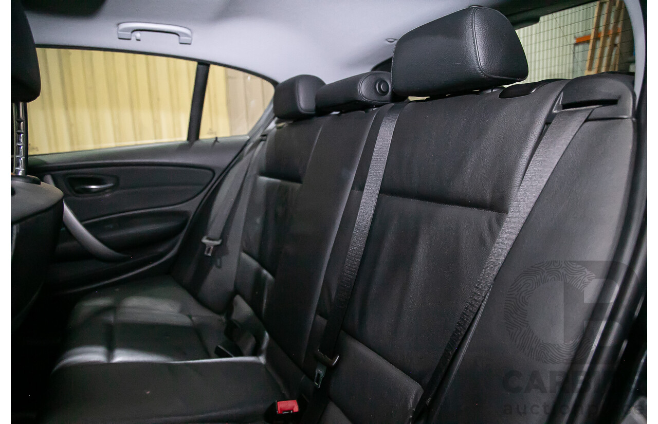 6/2010 BMW 118i E87 MY10 5d Hatchback Black 2.0L