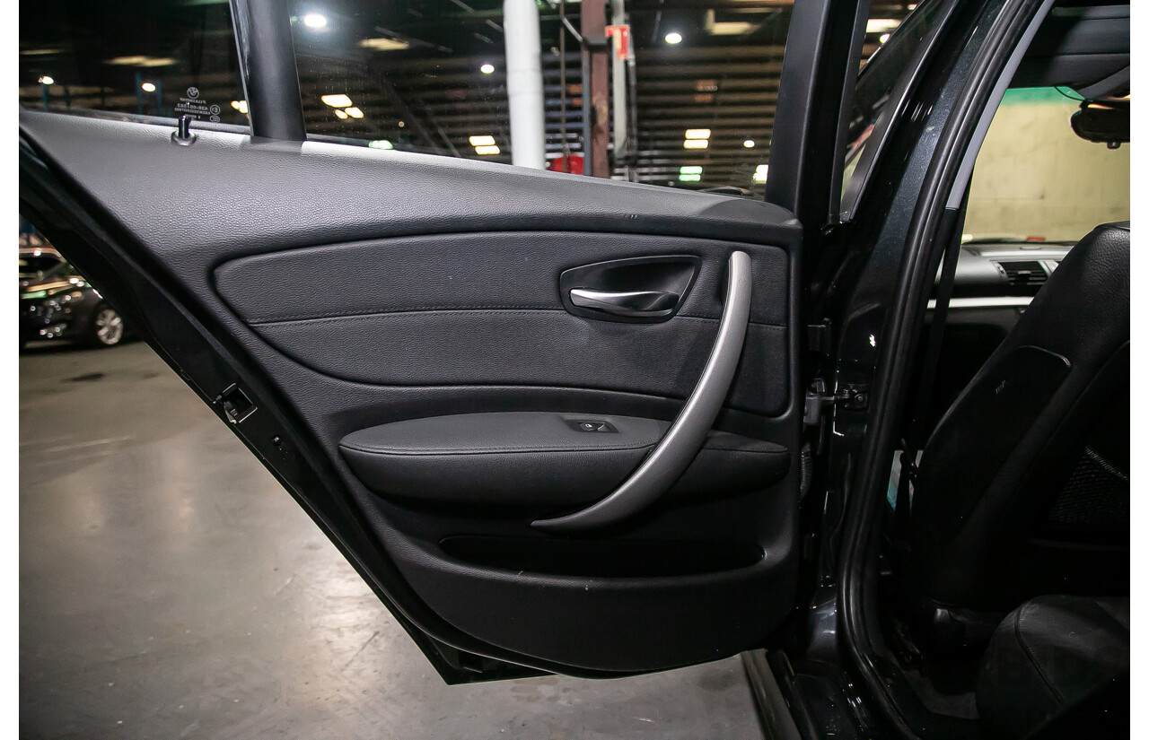 6/2010 BMW 118i E87 MY10 5d Hatchback Black 2.0L