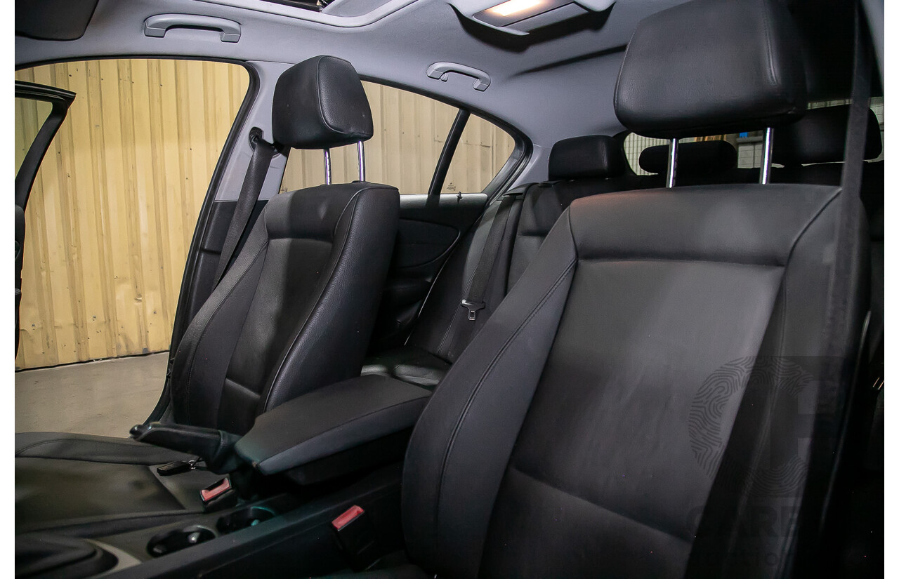 6/2010 BMW 118i E87 MY10 5d Hatchback Black 2.0L