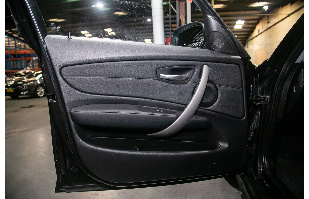 6/2010 BMW 118i E87 MY10 5d Hatchback Black 2.0L