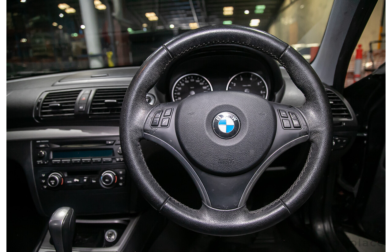 6/2010 BMW 118i E87 MY10 5d Hatchback Black 2.0L