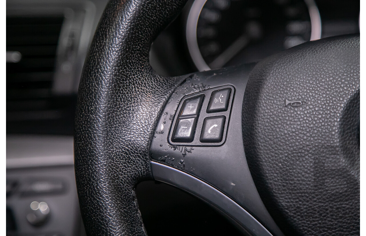 6/2010 BMW 118i E87 MY10 5d Hatchback Black 2.0L