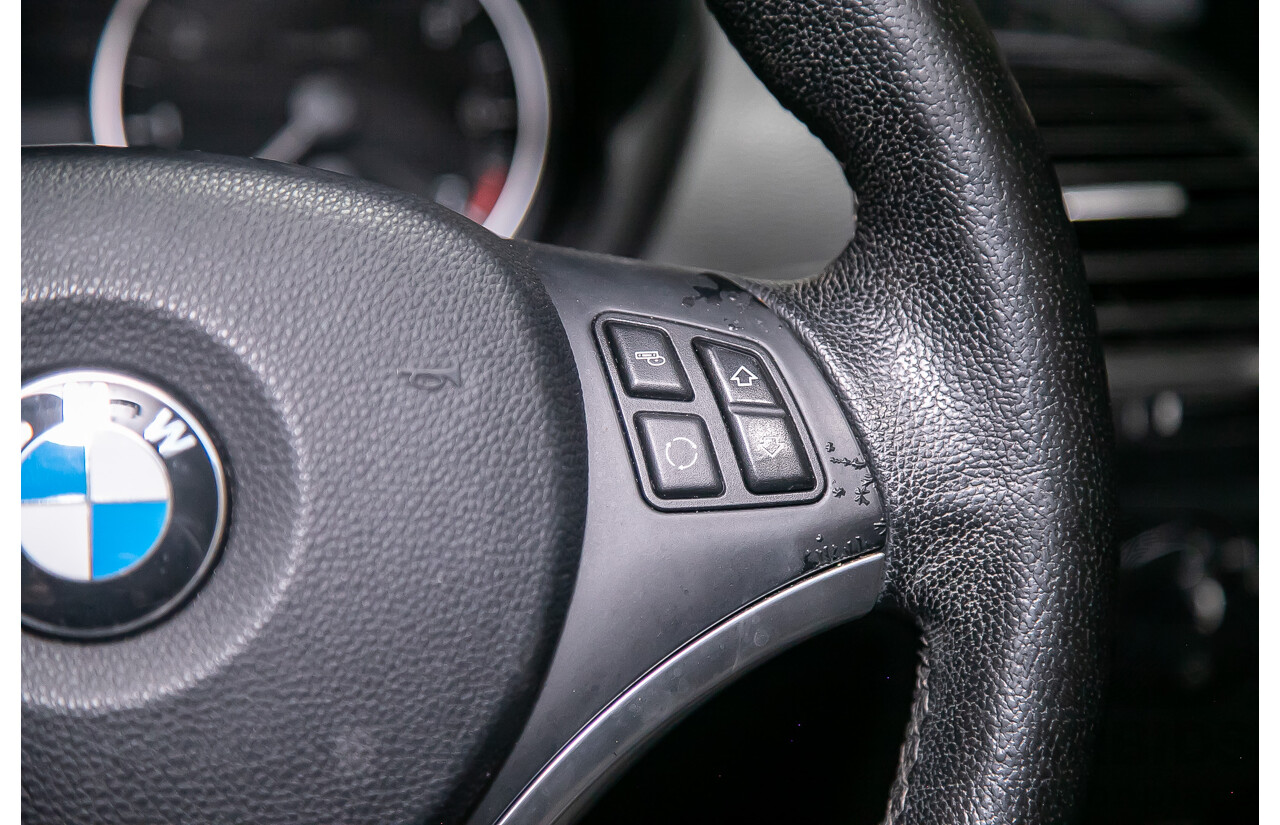 6/2010 BMW 118i E87 MY10 5d Hatchback Black 2.0L