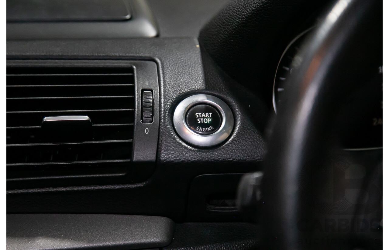 6/2010 BMW 118i E87 MY10 5d Hatchback Black 2.0L