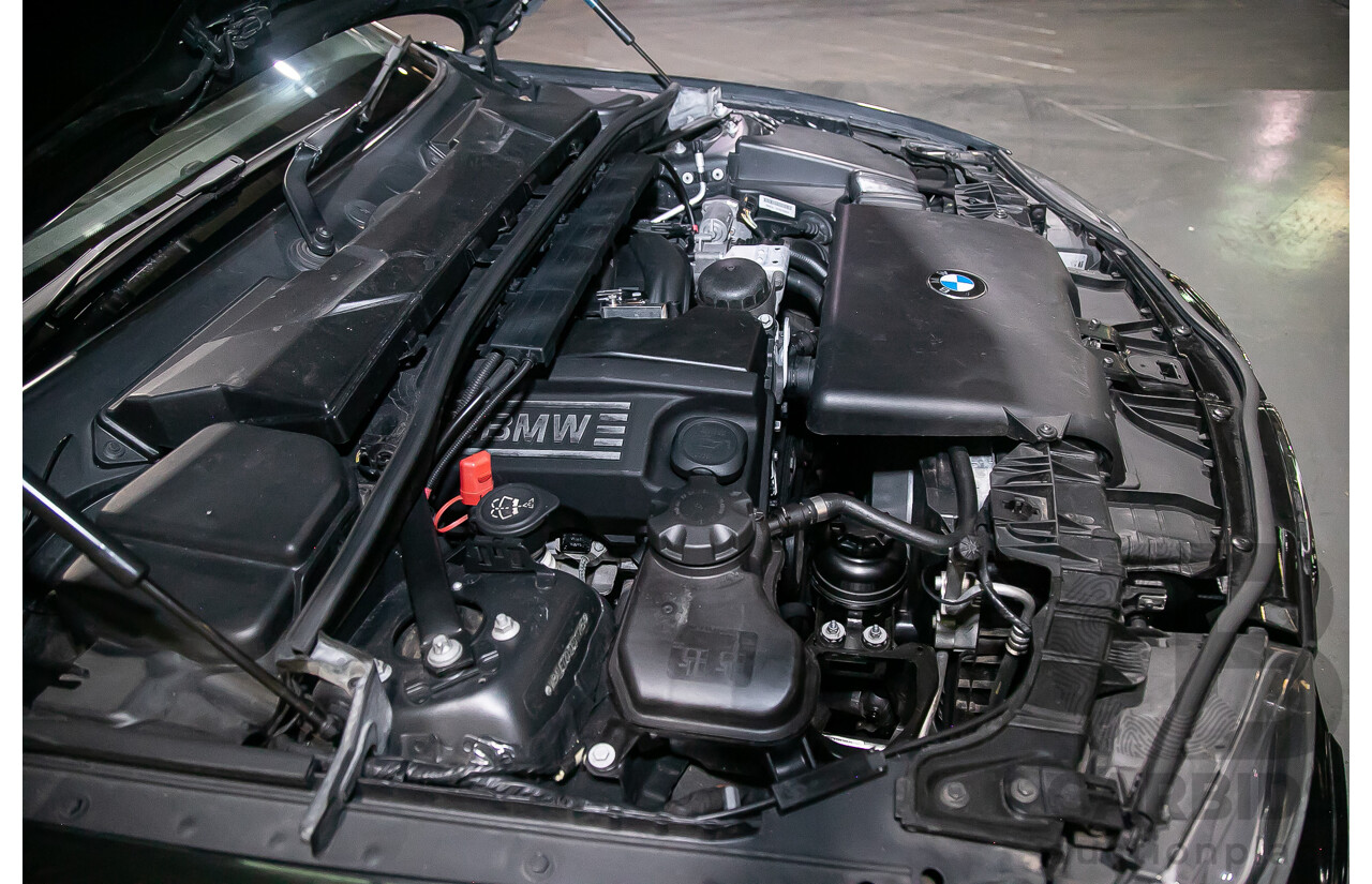 6/2010 BMW 118i E87 MY10 5d Hatchback Black 2.0L