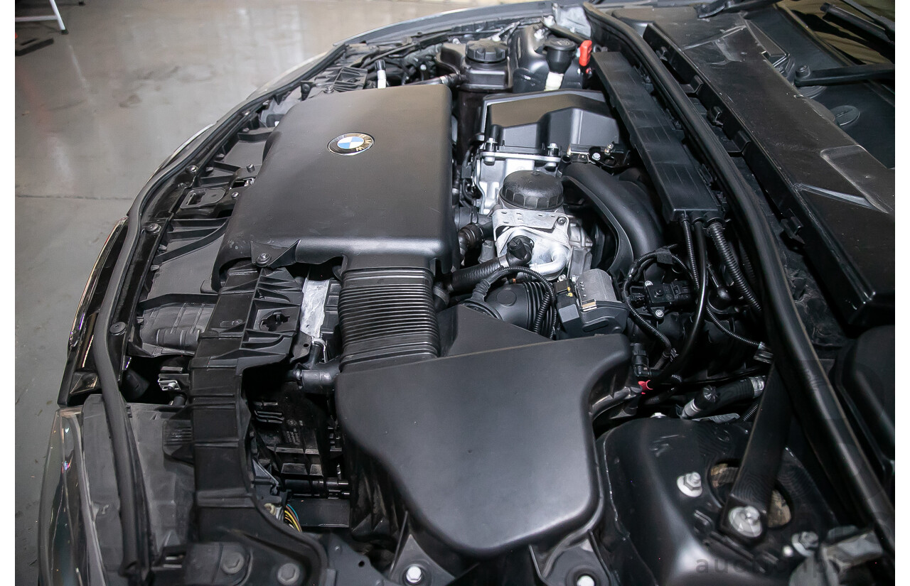 6/2010 BMW 118i E87 MY10 5d Hatchback Black 2.0L