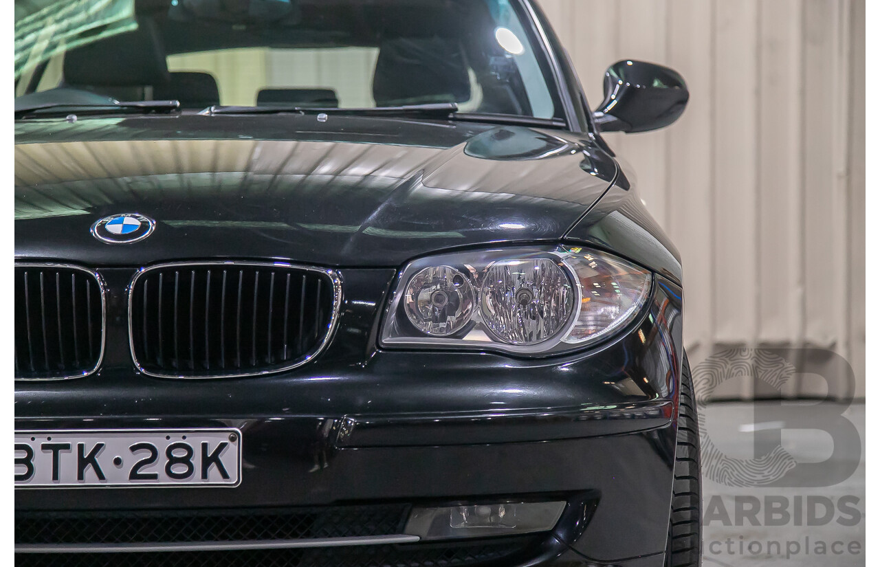 6/2010 BMW 118i E87 MY10 5d Hatchback Black 2.0L