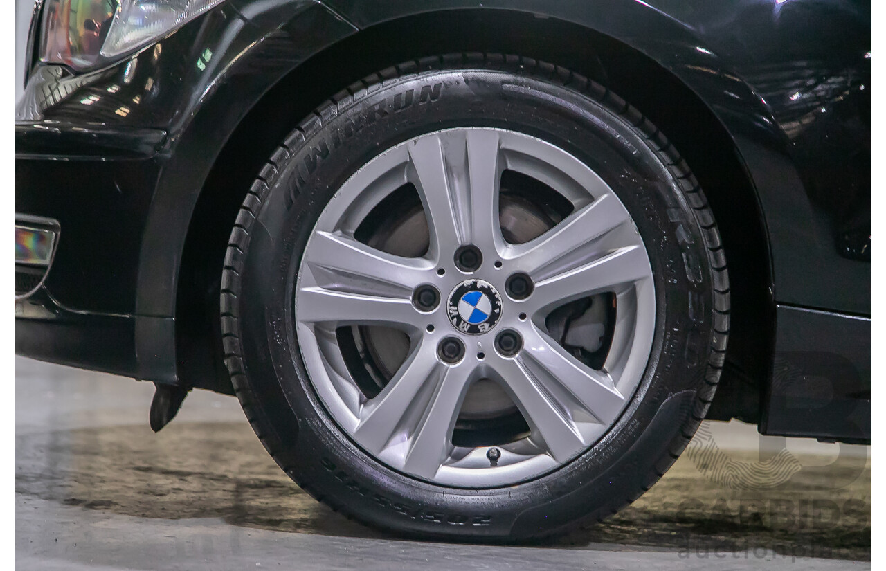 6/2010 BMW 118i E87 MY10 5d Hatchback Black 2.0L