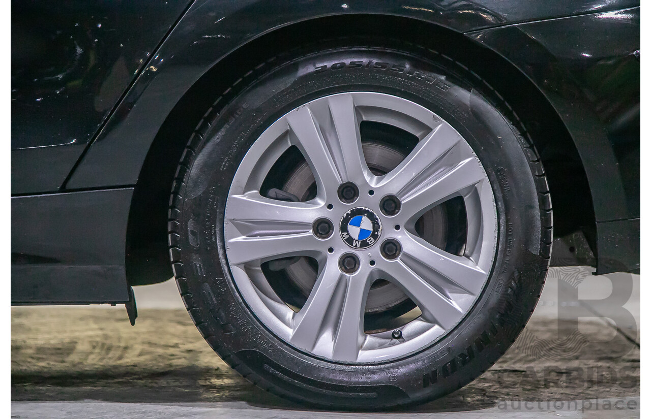 6/2010 BMW 118i E87 MY10 5d Hatchback Black 2.0L