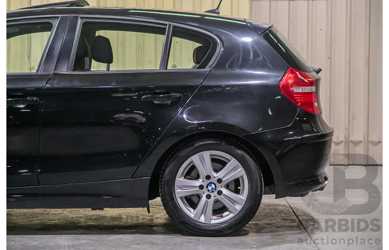 6/2010 BMW 118i E87 MY10 5d Hatchback Black 2.0L