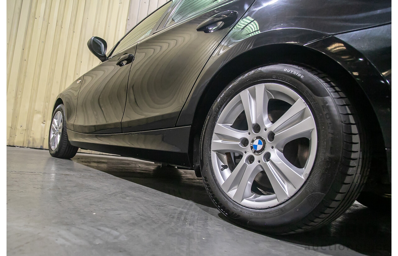 6/2010 BMW 118i E87 MY10 5d Hatchback Black 2.0L