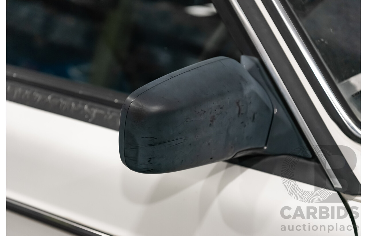 9/1990 Volvo 240 GL  4d Sedan White 2.3L