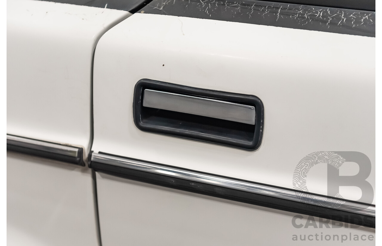 9/1990 Volvo 240 GL  4d Sedan White 2.3L