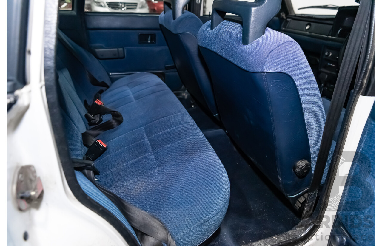 9/1990 Volvo 240 GL  4d Sedan White 2.3L