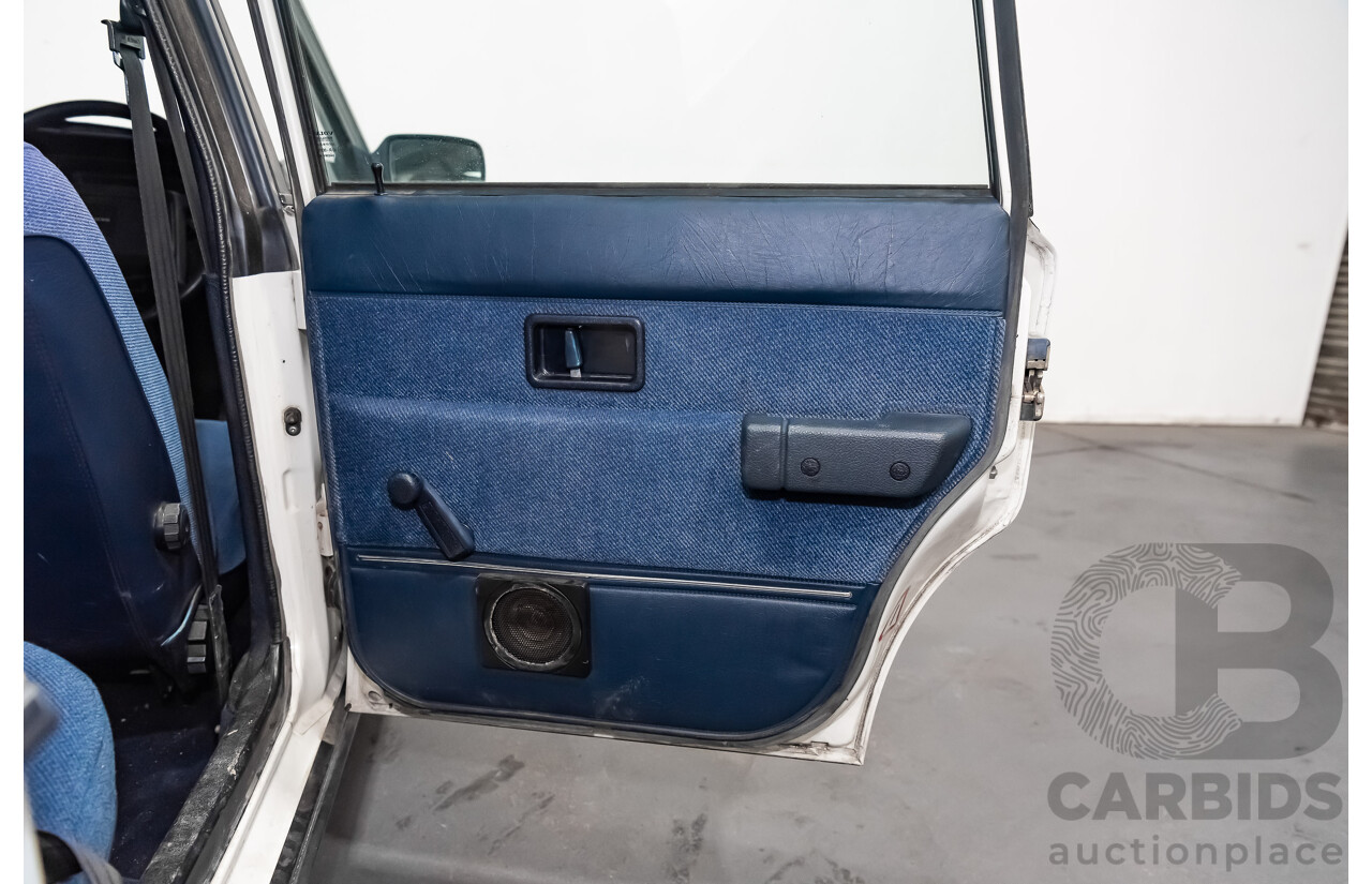 9/1990 Volvo 240 GL  4d Sedan White 2.3L