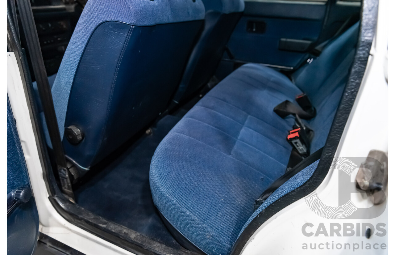 9/1990 Volvo 240 GL  4d Sedan White 2.3L