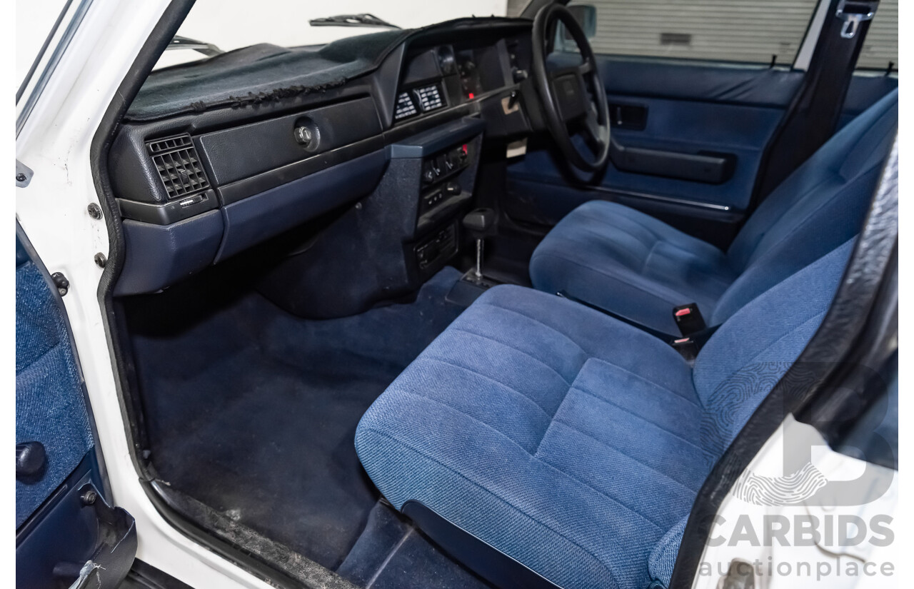 9/1990 Volvo 240 GL  4d Sedan White 2.3L