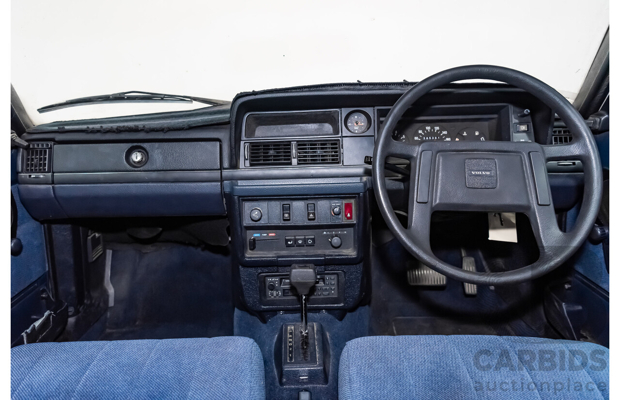 9/1990 Volvo 240 GL  4d Sedan White 2.3L