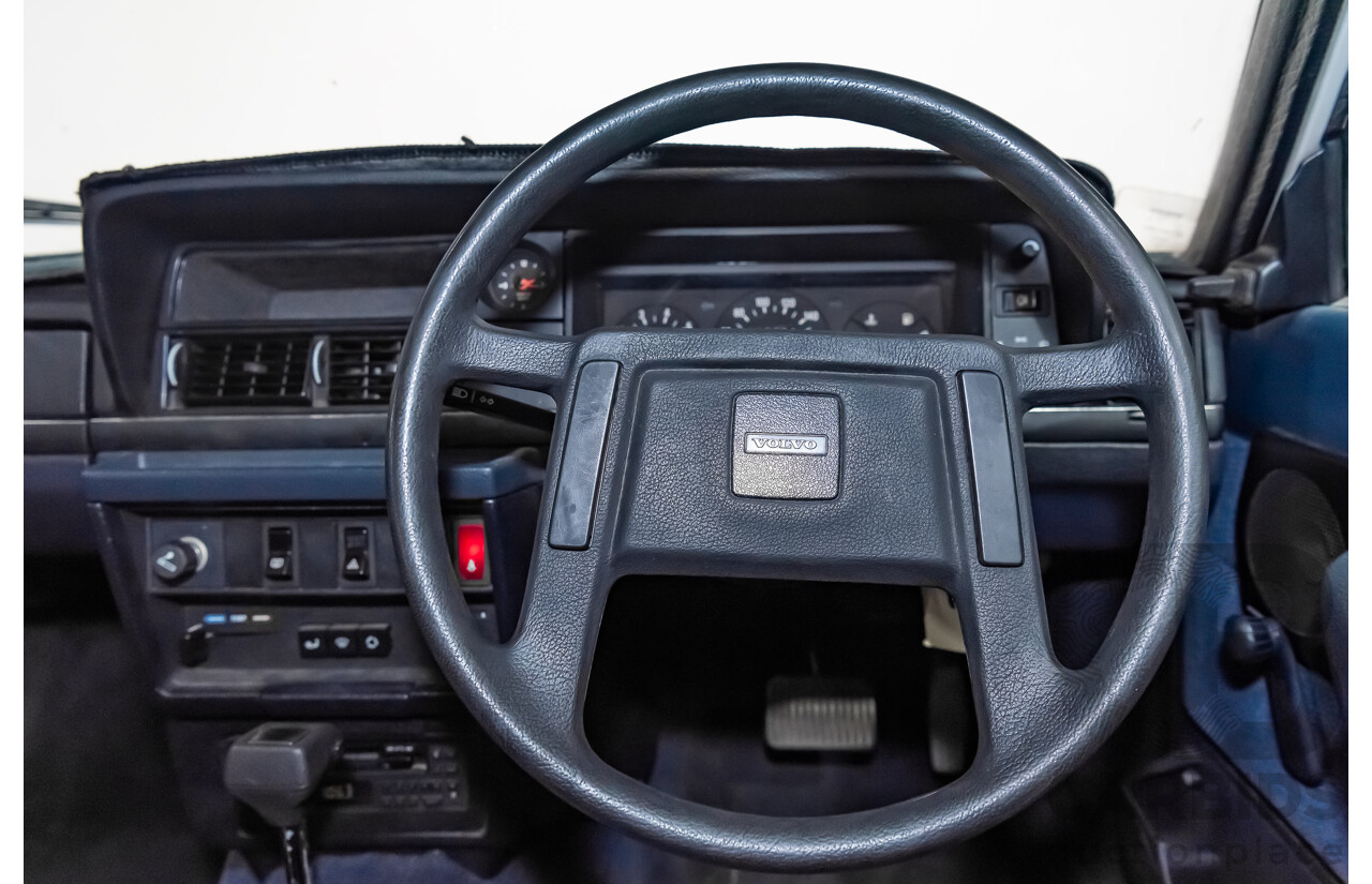 9/1990 Volvo 240 GL  4d Sedan White 2.3L