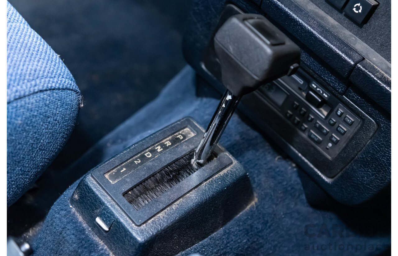 9/1990 Volvo 240 GL  4d Sedan White 2.3L