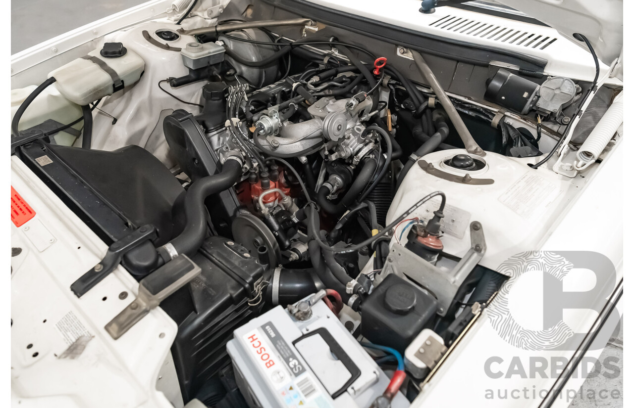 9/1990 Volvo 240 GL  4d Sedan White 2.3L