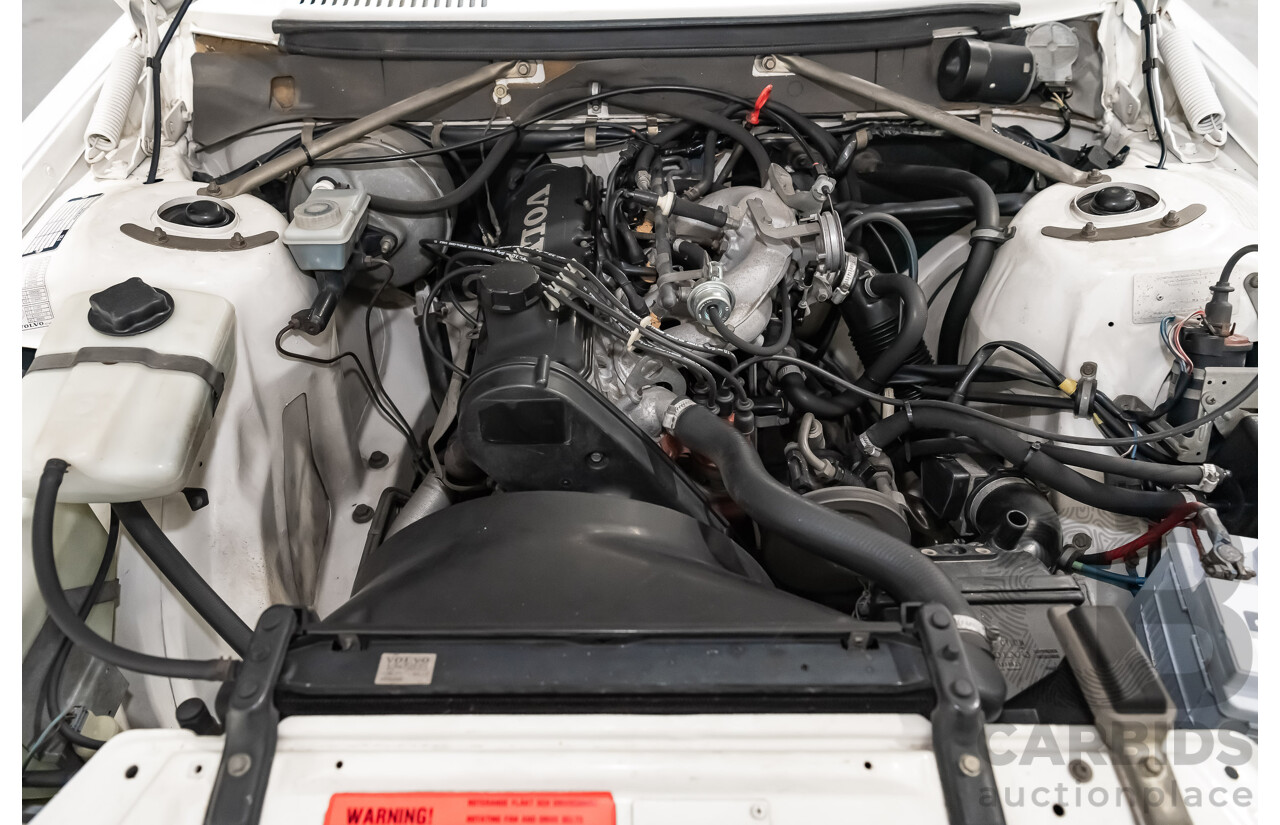 9/1990 Volvo 240 GL  4d Sedan White 2.3L