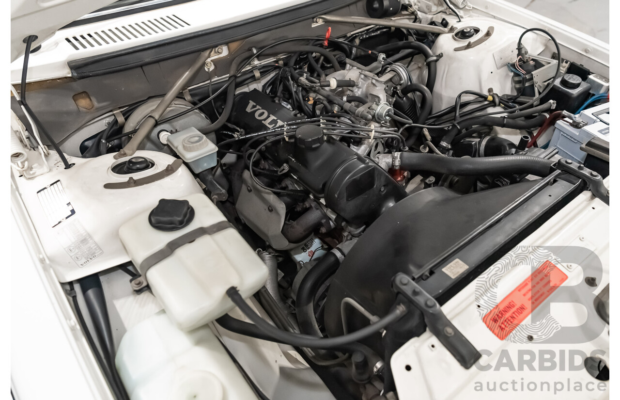 9/1990 Volvo 240 GL  4d Sedan White 2.3L