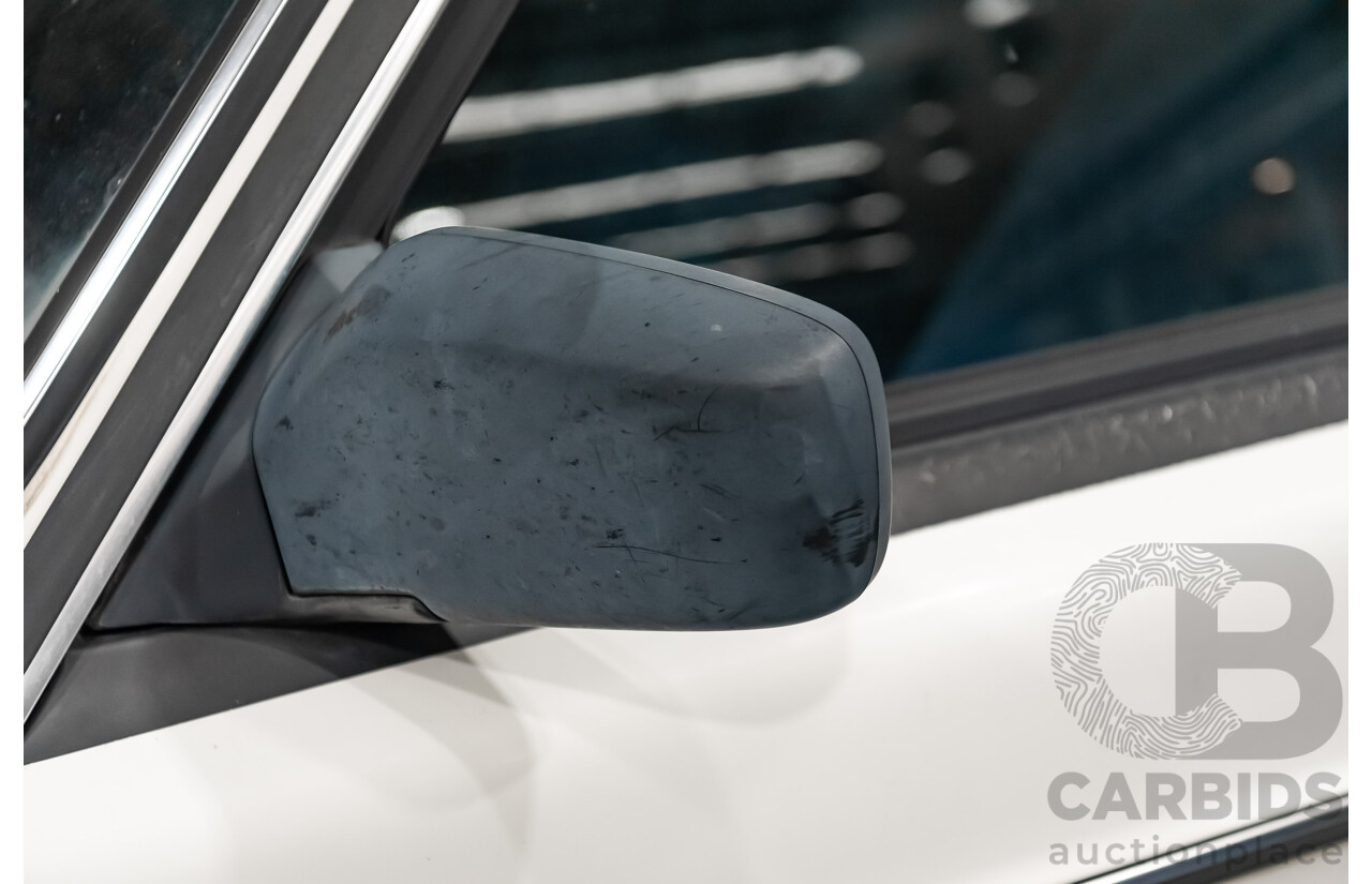 9/1990 Volvo 240 GL  4d Sedan White 2.3L