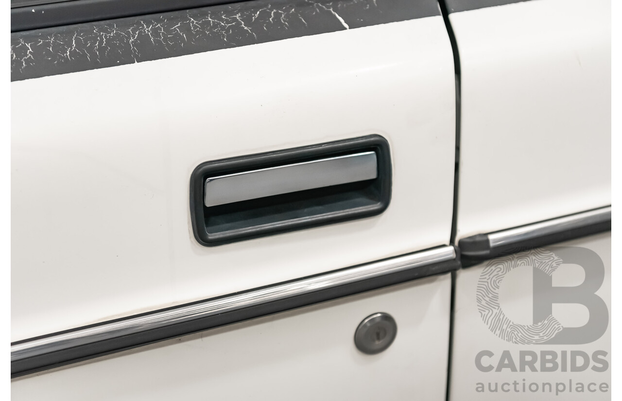 9/1990 Volvo 240 GL  4d Sedan White 2.3L