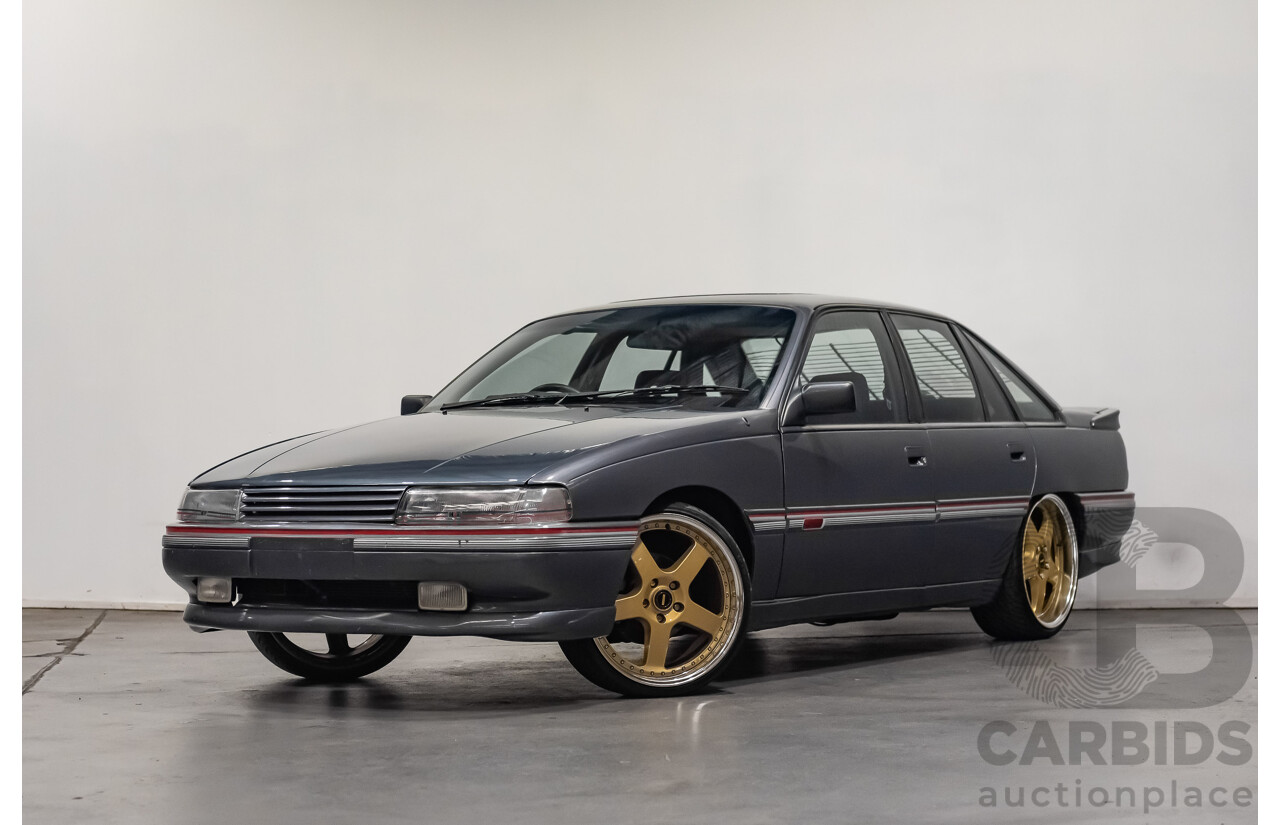 3/1990 Holden Commodore SS VN 4d Sedan A9F Atlas Grey V8 5.0L