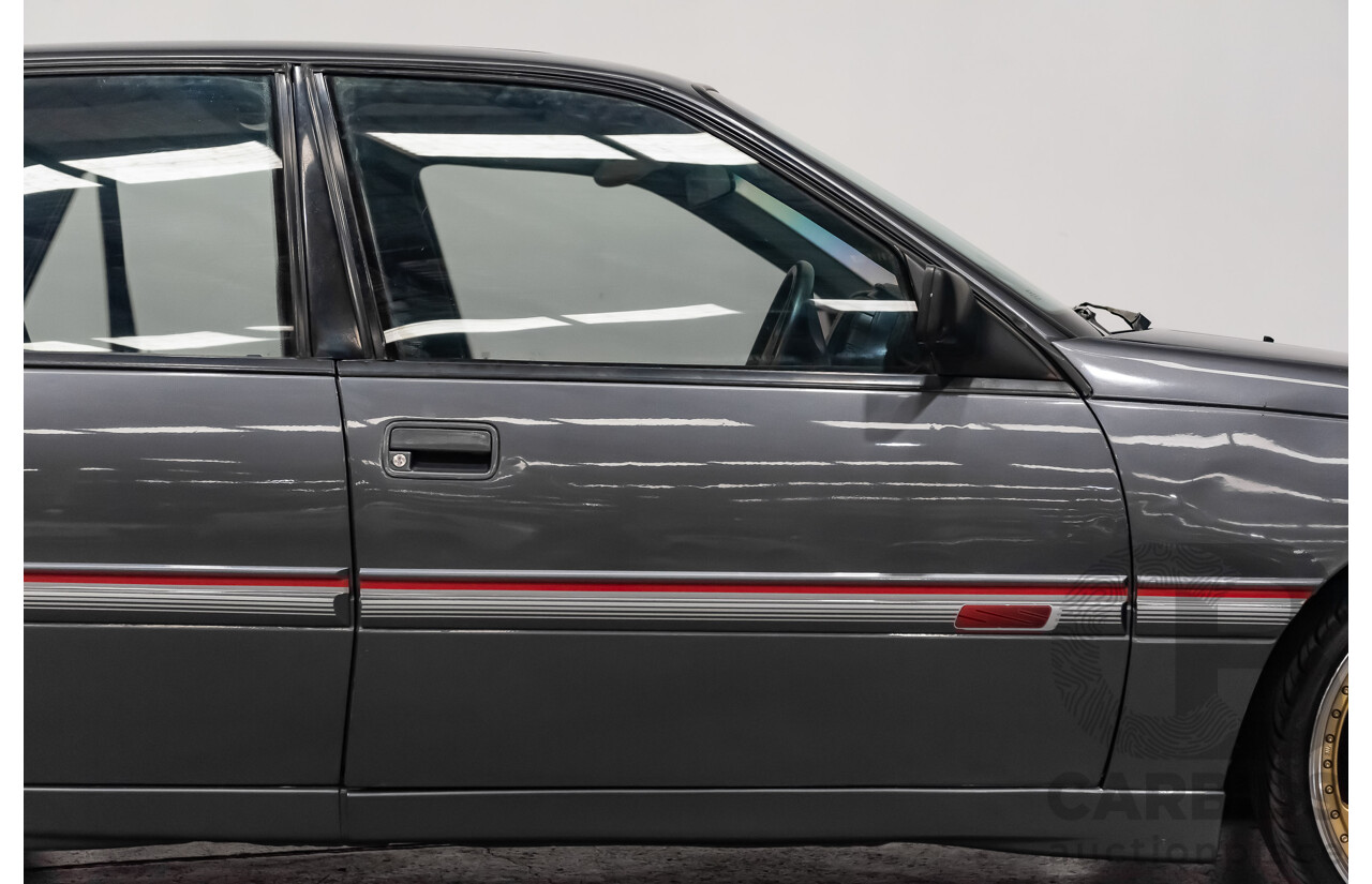 3/1990 Holden Commodore SS VN 4d Sedan A9F Atlas Grey V8 5.0L