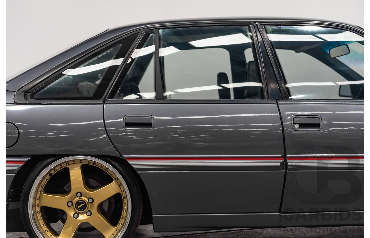 3/1990 Holden Commodore SS VN 4d Sedan A9F Atlas Grey V8 5.0L