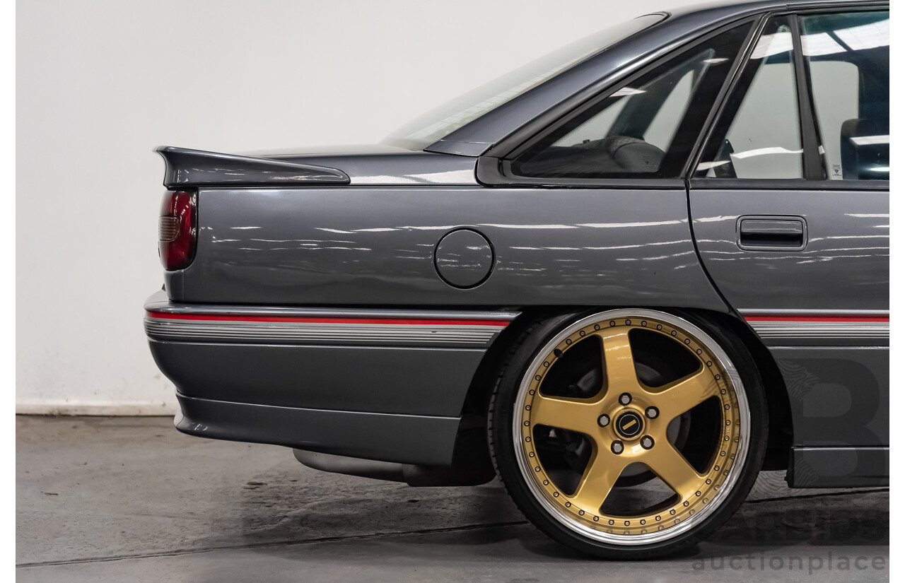 3/1990 Holden Commodore SS VN 4d Sedan A9F Atlas Grey V8 5.0L