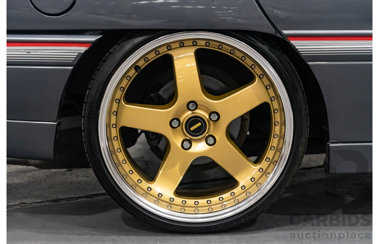 3/1990 Holden Commodore SS VN 4d Sedan A9F Atlas Grey V8 5.0L