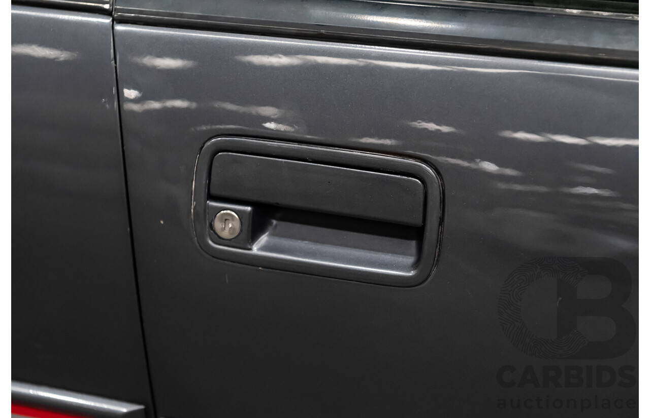 3/1990 Holden Commodore SS VN 4d Sedan A9F Atlas Grey V8 5.0L