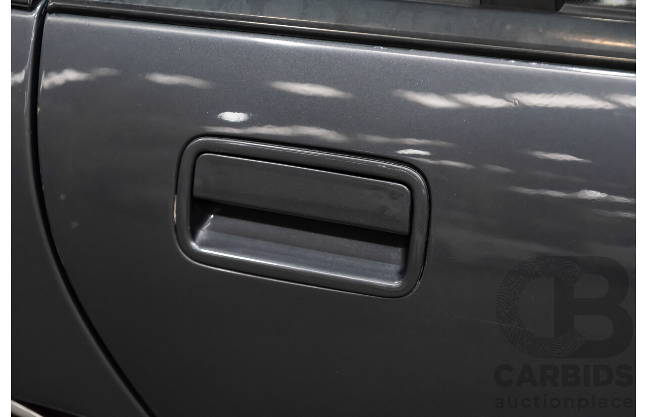 3/1990 Holden Commodore SS VN 4d Sedan A9F Atlas Grey V8 5.0L