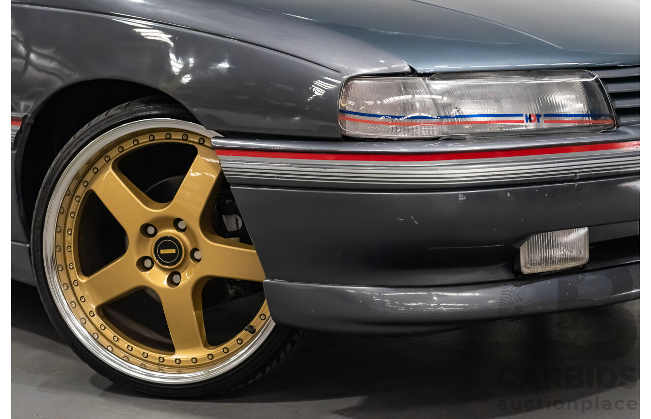 3/1990 Holden Commodore SS VN 4d Sedan A9F Atlas Grey V8 5.0L