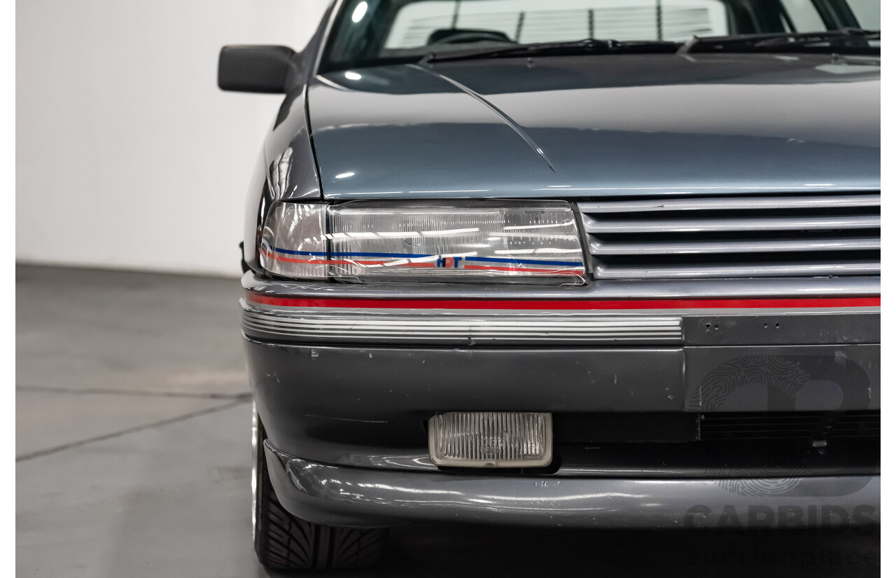3/1990 Holden Commodore SS VN 4d Sedan A9F Atlas Grey V8 5.0L