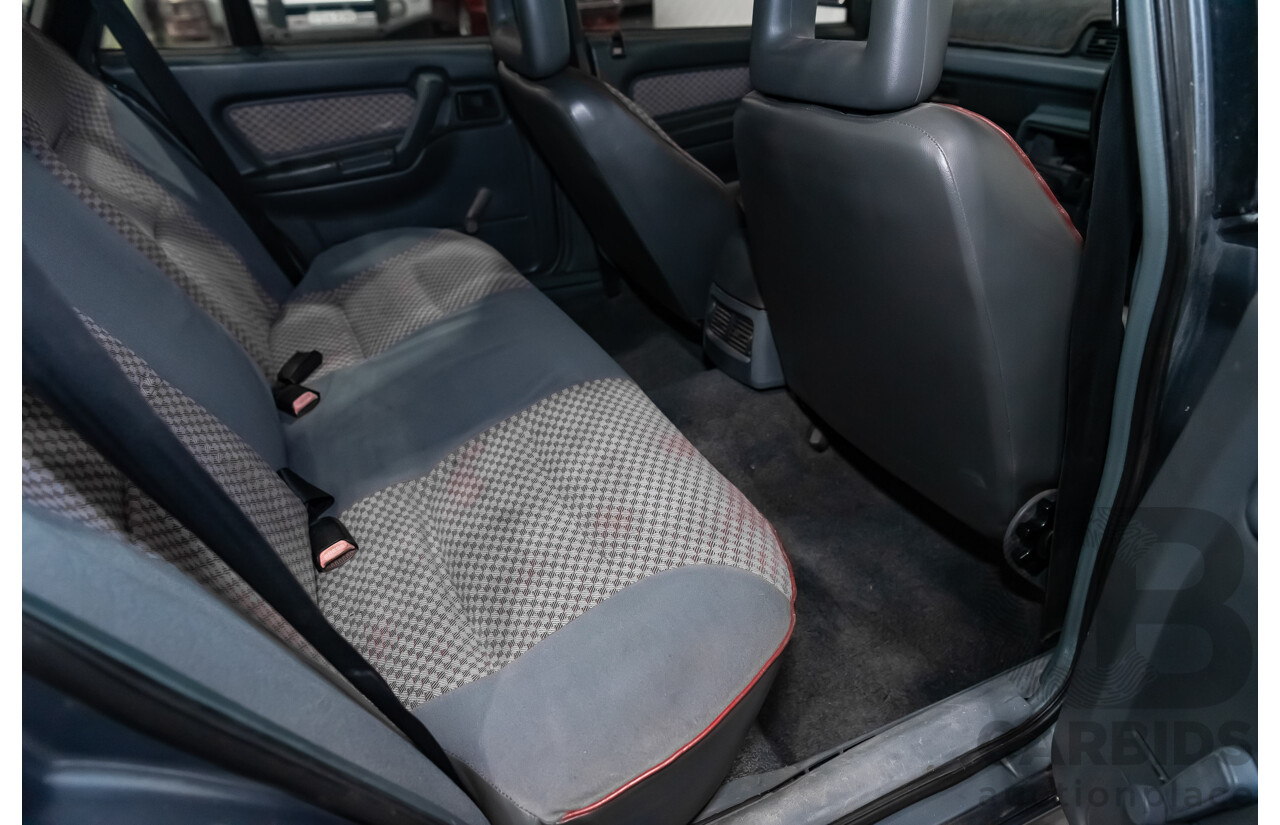 3/1990 Holden Commodore SS VN 4d Sedan A9F Atlas Grey V8 5.0L